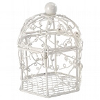 Weißes Tischaccessoires in der Optik einer Voliere