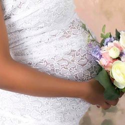 Tipps zu Brautkleid und Styling für schwangere Bräute
